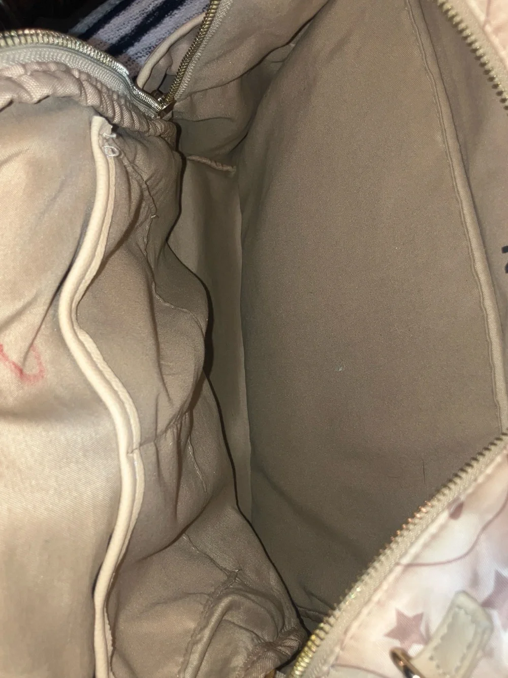 Madden NYC smiley faced back pack with gold hardware , beige & brown 9 pockets z
